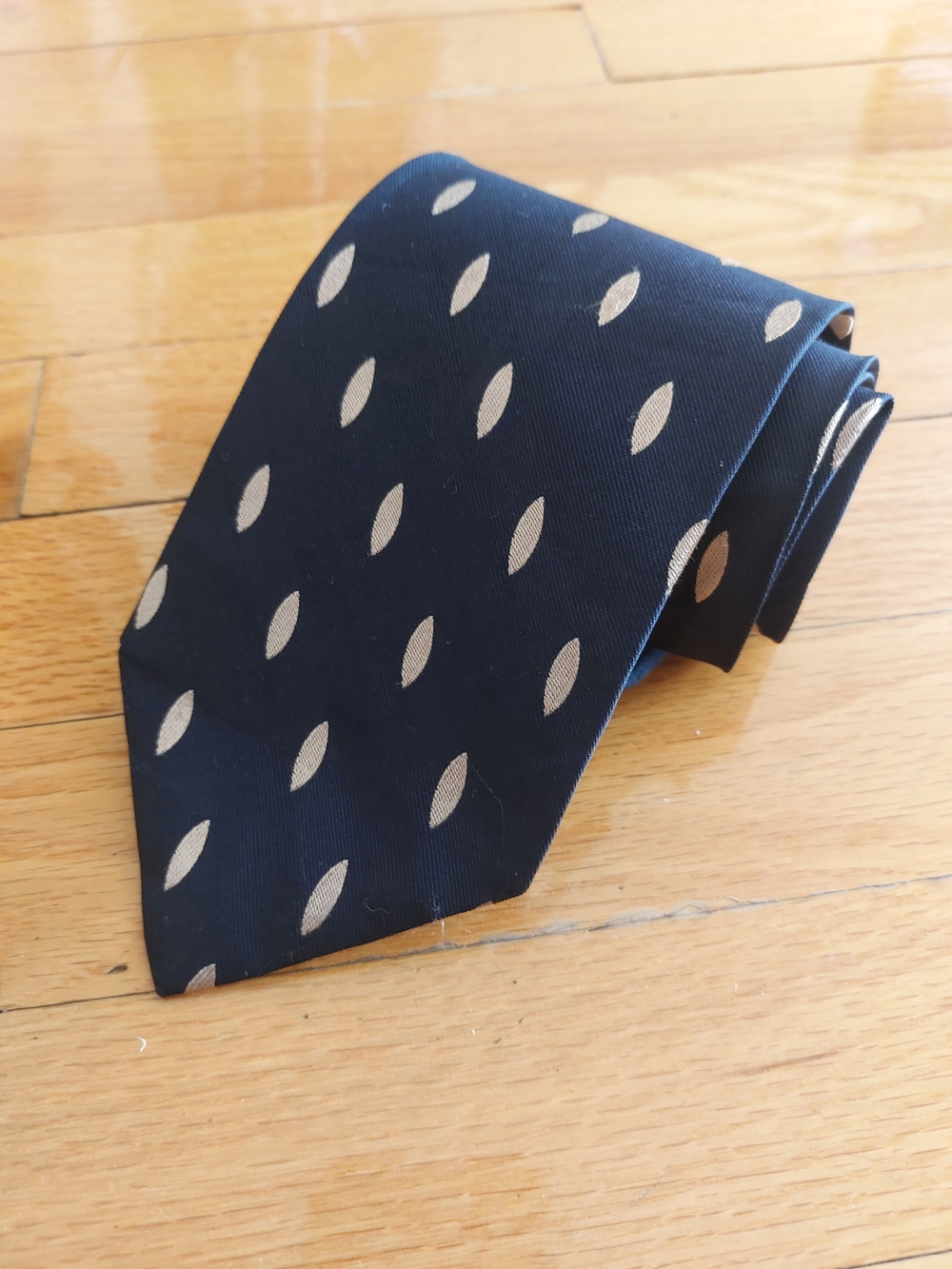 Giorgio Armani Navy Tie with Gold Oval Motif
